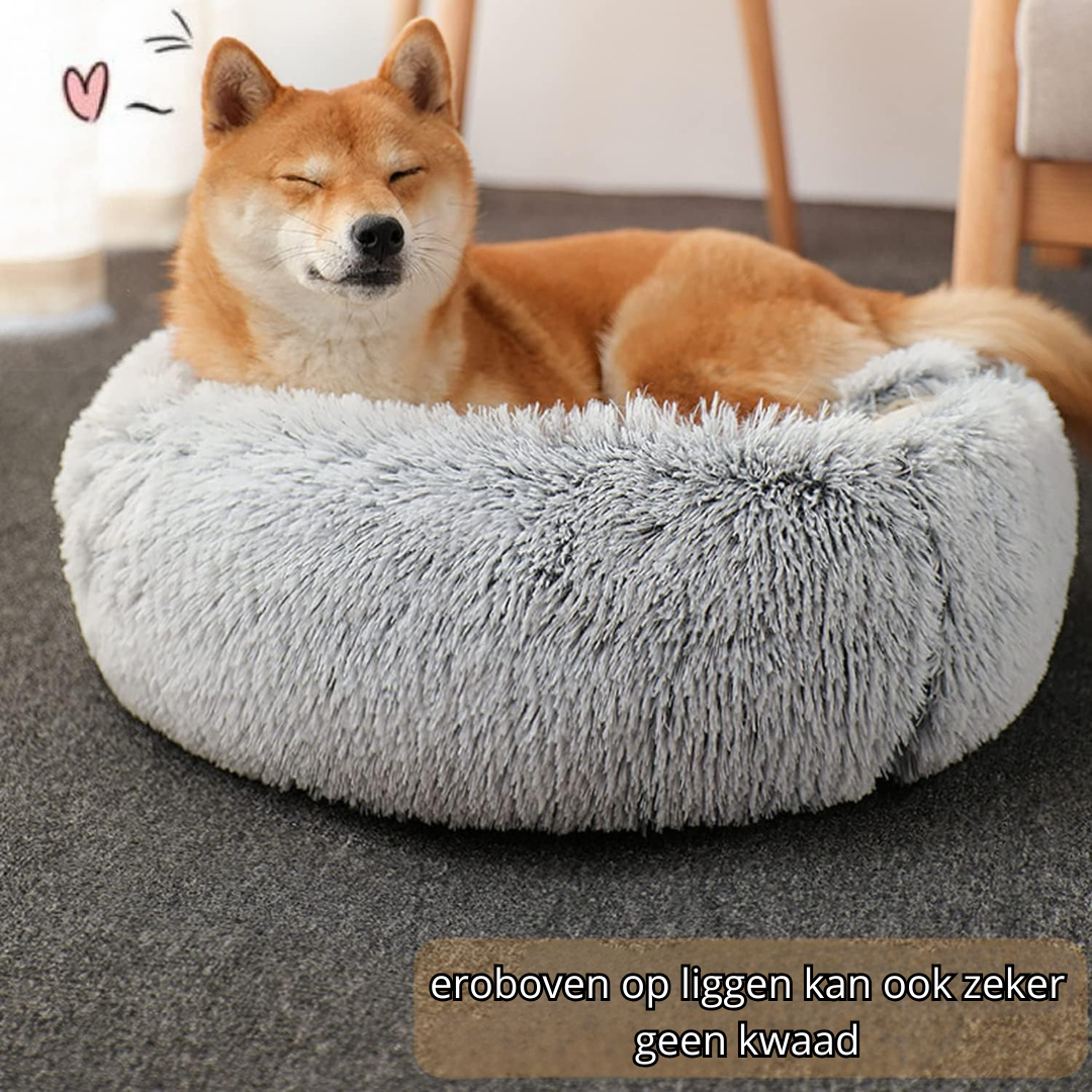 pluche mand bovenop liggen