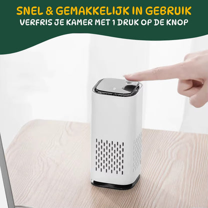 Hondenluchtverfrisser in wit die met één druk op de knop wordt ingeschakeld voor snelle geurverwijdering.