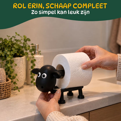 Handen plaatsen een wc-rol in de zwarte schaap toiletrolhouder.